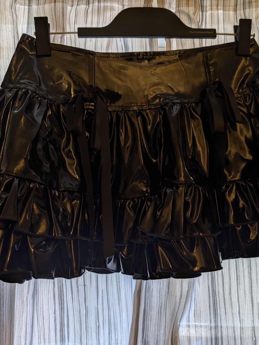 Shiny Black Ruffled Mini Skirt with Front Ribbon Details